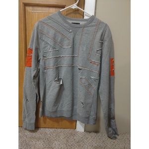 Large orange and grey ripped sweatshirt